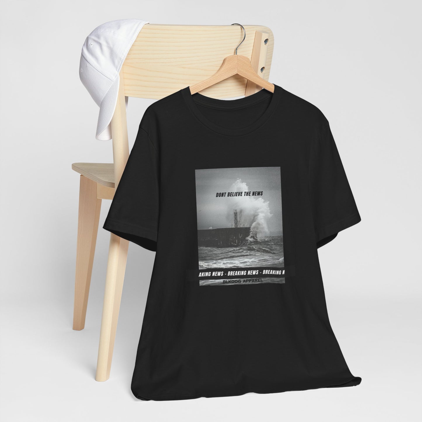 Don't Believe the News - Unisex Jersey Short Sleeve Tee